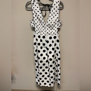 One of a kind polka dot jumpsuit with tie in the back and wide legs